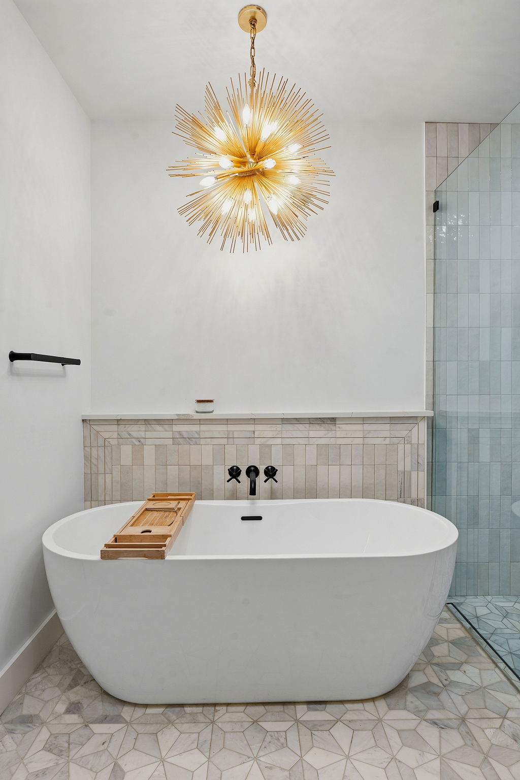 2004 Riverview Street Austin, TX 78702 - Photo 26 of 36 Freestanding soaking tub featuring matte black wall-mounted fixtures