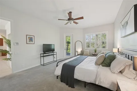 a bathroom with a tub a sink and a mirror