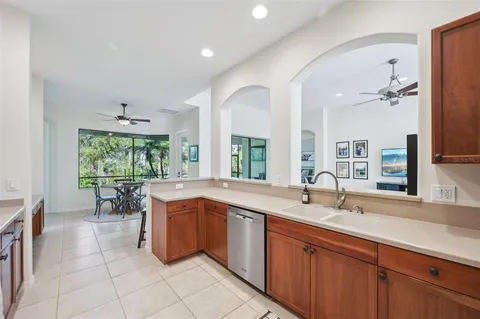 a kitchen with a sink and cabinets