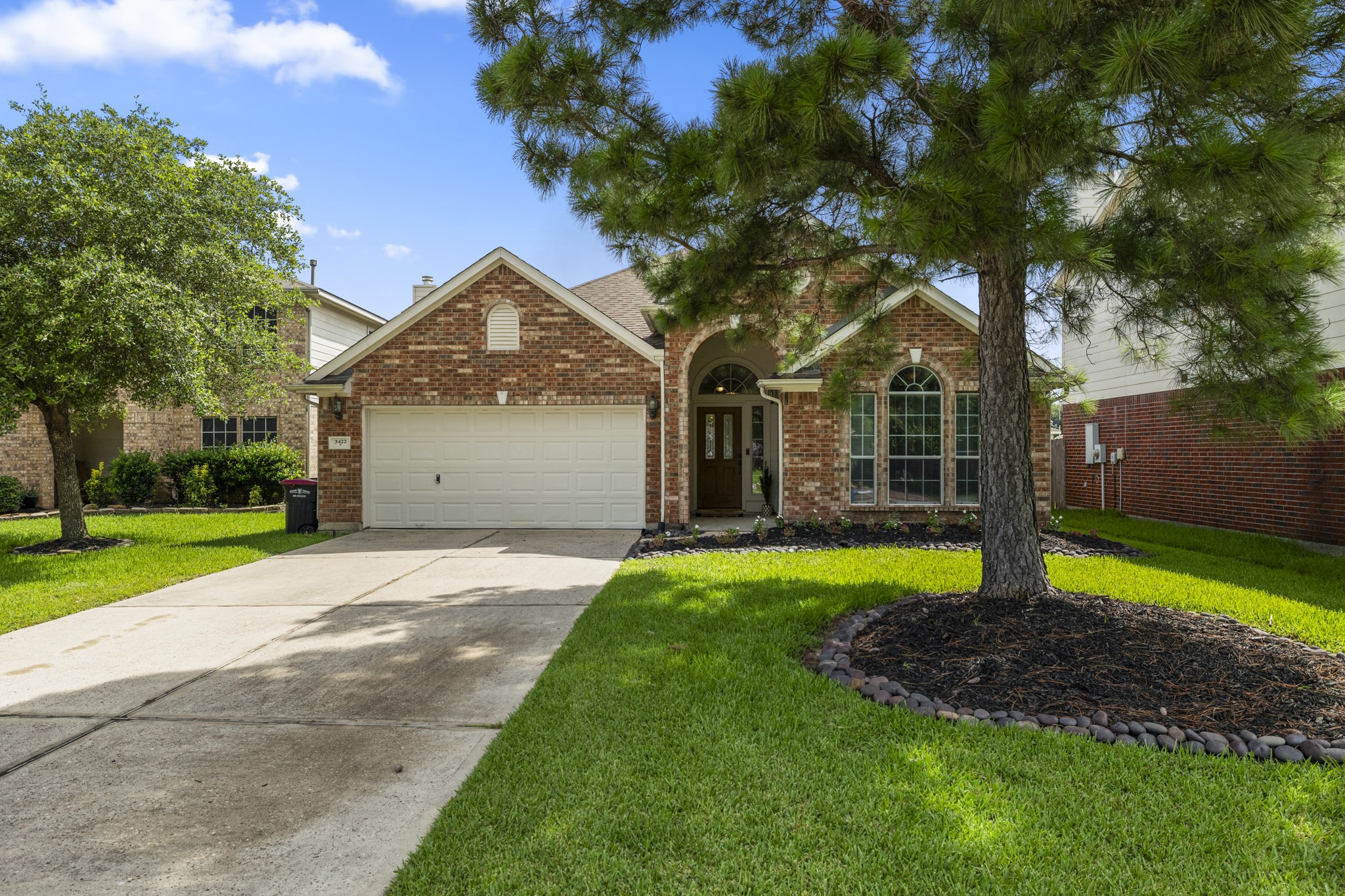 3422 Falcon Trail Court Spring, TX 77373 - Photo 2 of 35 a front view of a house with garden