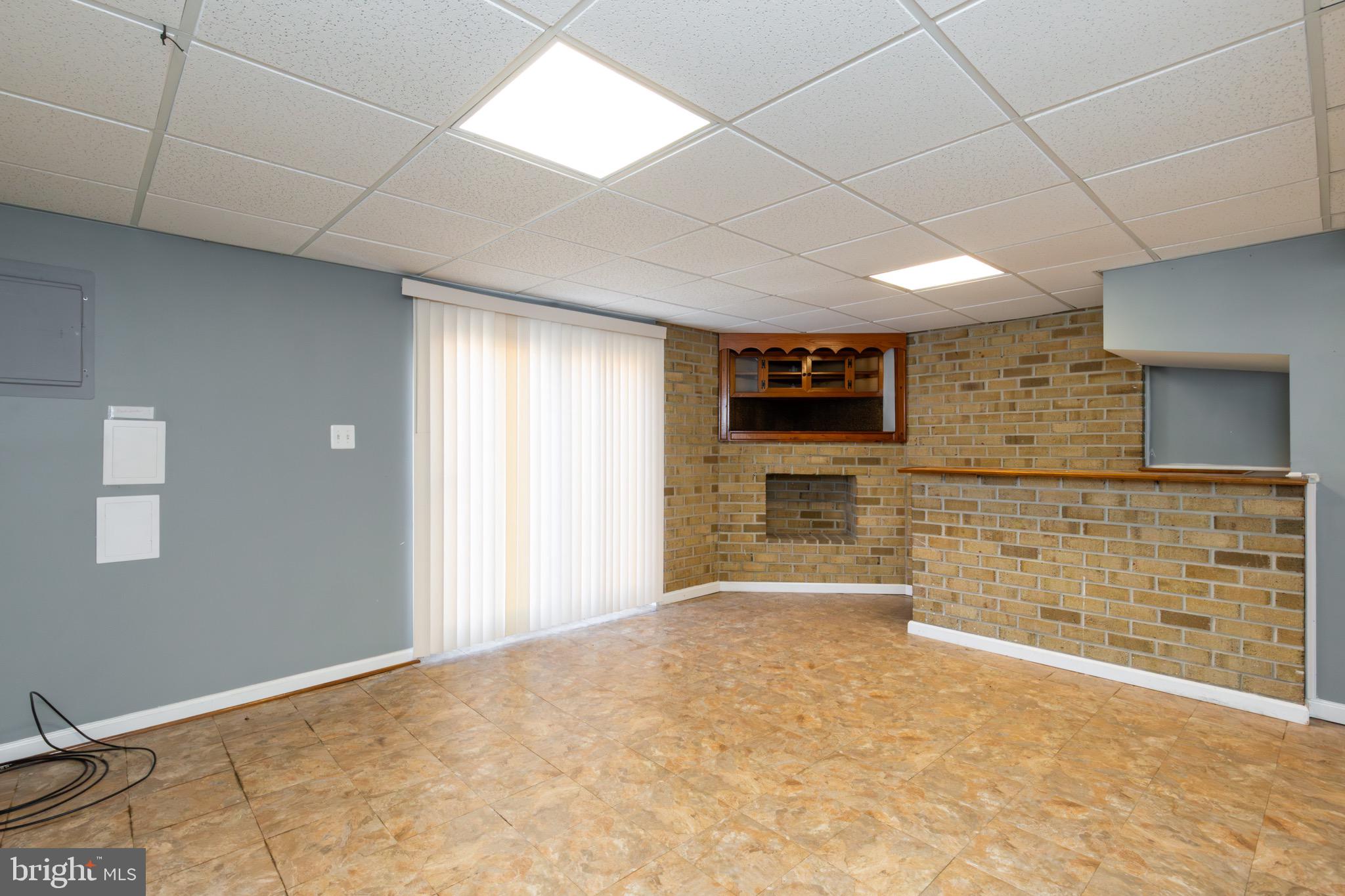 32 Bristol Court Stafford, VA 22556 - Photo 20 of 25 a view of an empty room with a fireplace