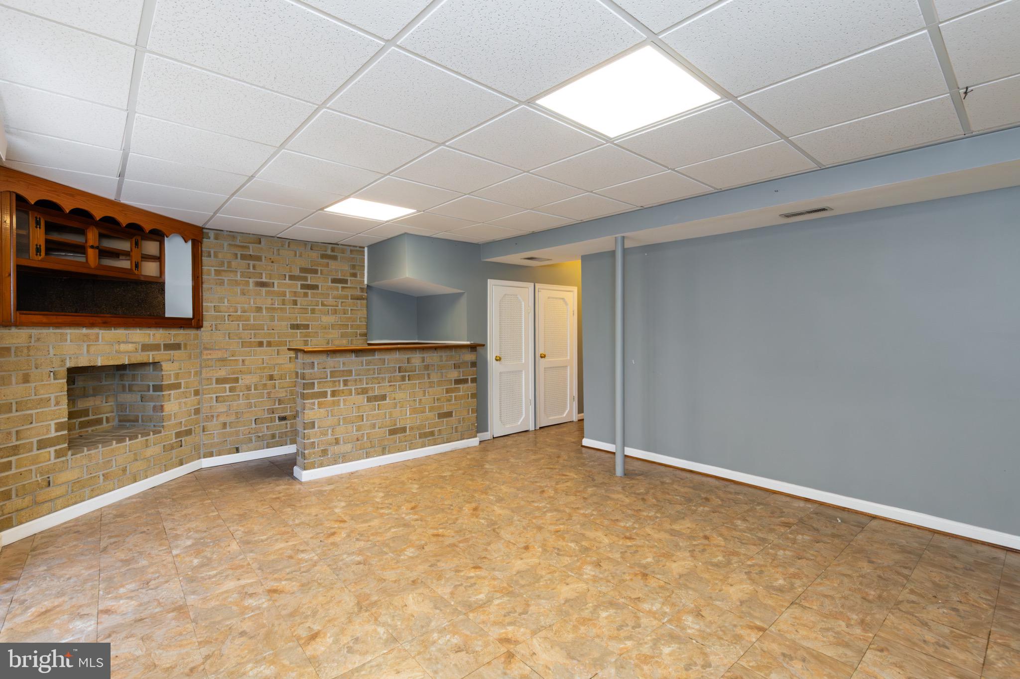 32 Bristol Court Stafford, VA 22556 - Photo 21 of 25 a view of an empty room with a fireplace