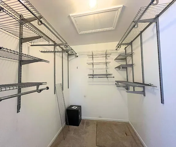a view of a room with racks on the wall
