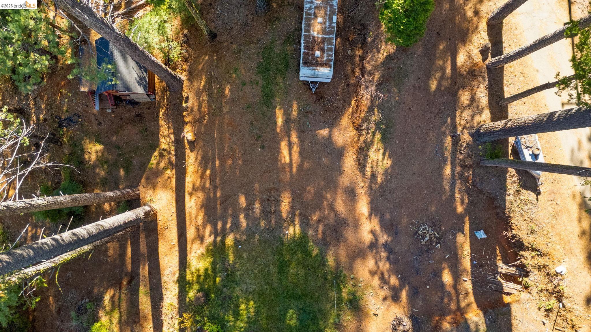 25777 Long Barn Sugar Pine Road Long Barn, CA 95335 - Photo 17 of 18 a backyard of a building
