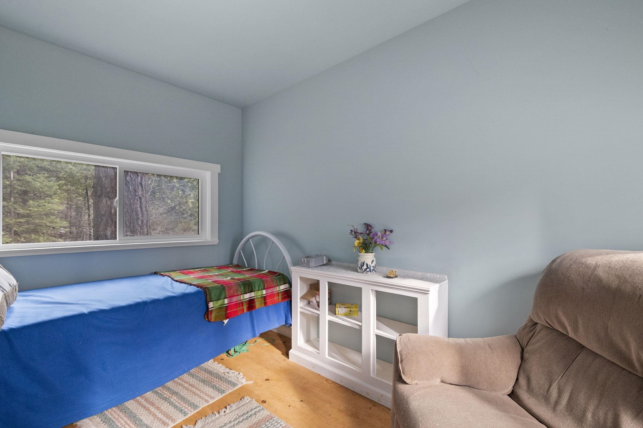 25777 Long Barn Sugar Pine Road Long Barn, CA 95335 - Photo 8 of 18 a living room with furniture and a window