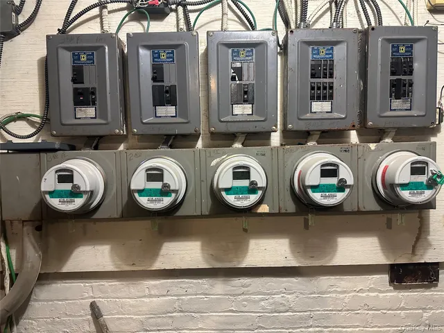 a bathroom with a sink mirror and a toilet