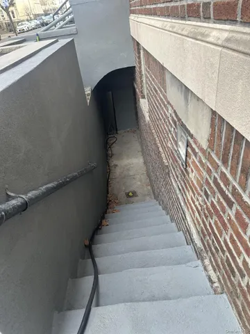 a view of cars parked in front of a building