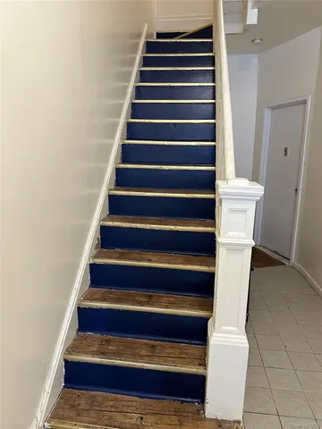 a view of water heater room with windows