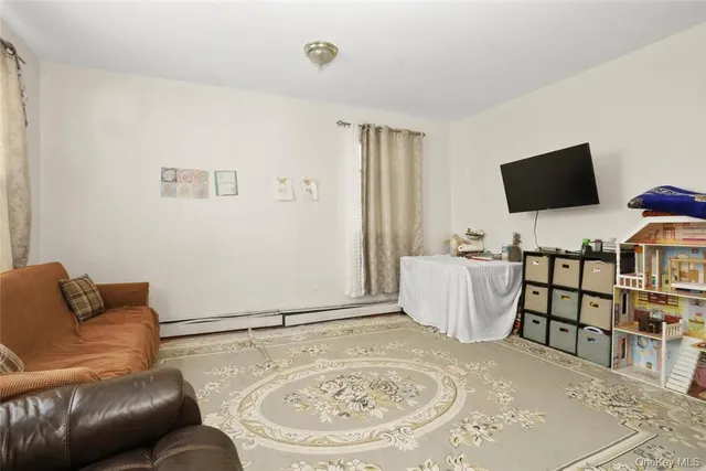 a bathroom with a sink mirror and a toilet