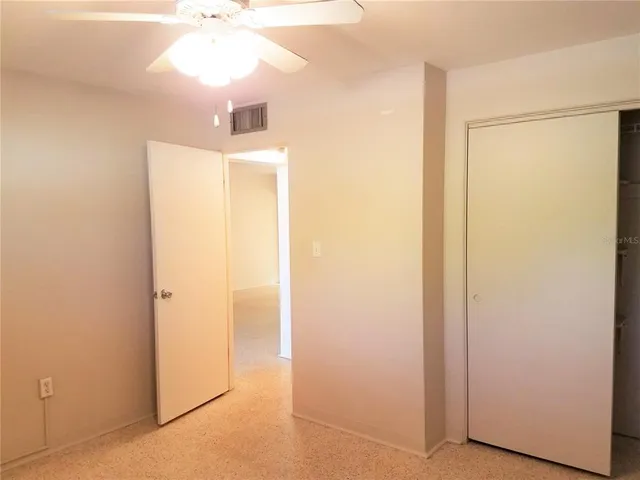 a view of a bathroom from the hallway
