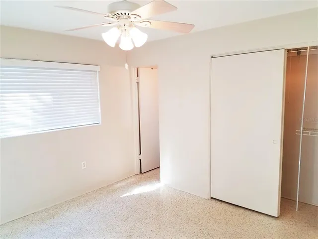 a view of a bathroom with a sink and a mirror