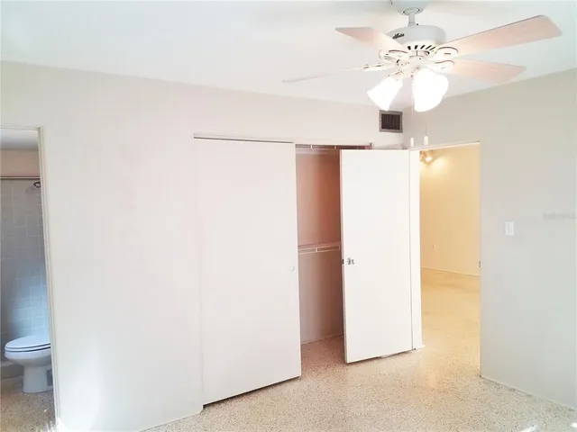 a house with a plant in front of it