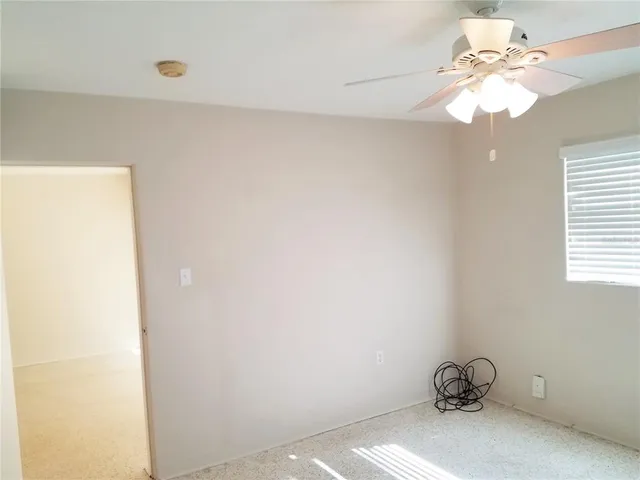 a view of a yard with swimming pool