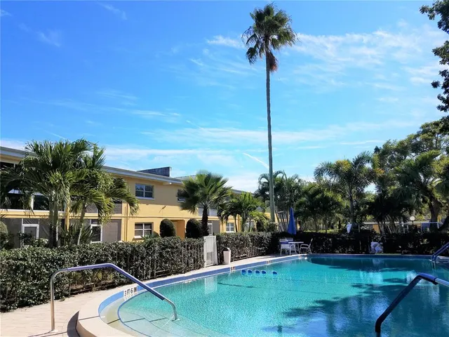 a view of a closet area with an empty room