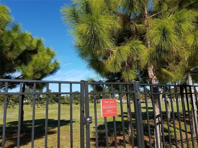 a view of a golf course with a lake
