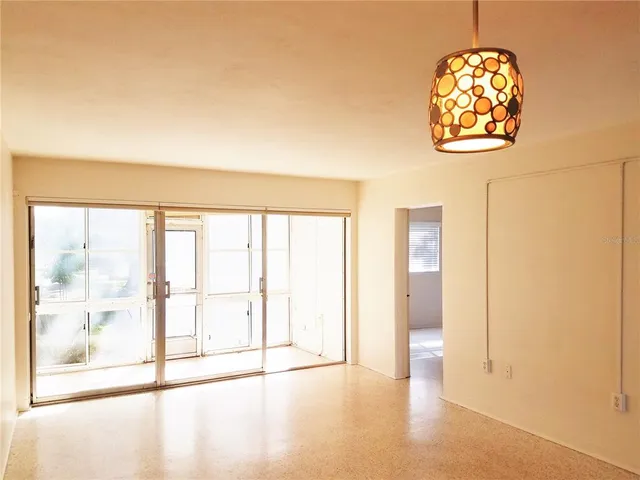 a kitchen with stainless steel appliances a refrigerator and cabinets