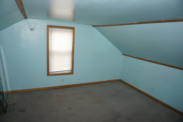 229 East 1st Street Spring Valley, IL 61362 - Photo 11 of 14 a view of a small space with wooden floor and a window