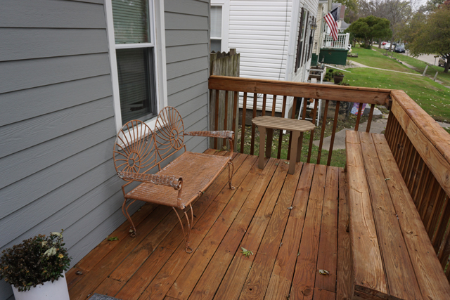 229 East 1st Street Spring Valley, IL 61362 - Photo 2 of 14 a view of a wooden deck with a bench