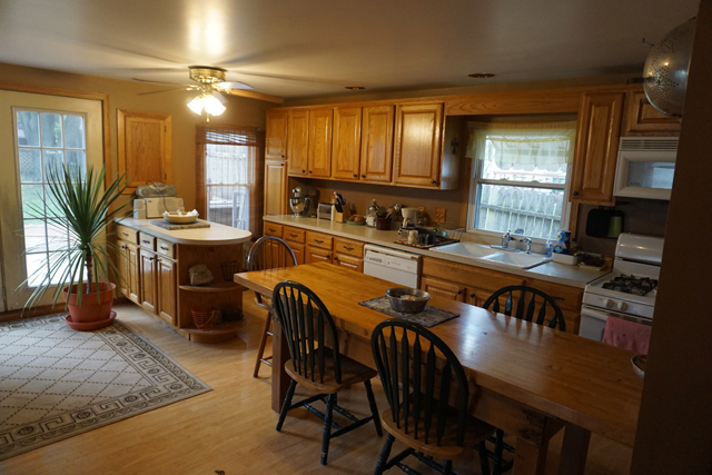 229 East 1st Street Spring Valley, IL 61362 - Photo 4 of 14 a view of a dining room with furniture window and wooden floor