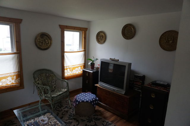 229 East 1st Street Spring Valley, IL 61362 - Photo 10 of 14 a living room with chair and a window