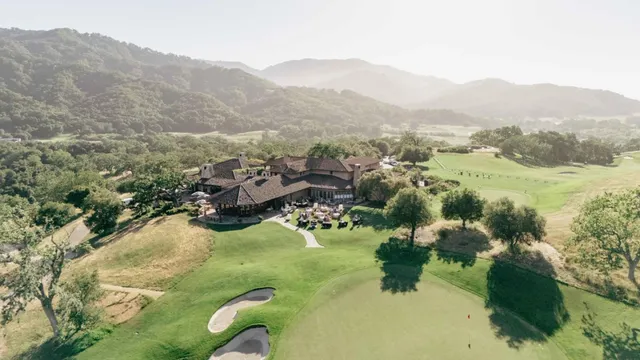 a view of a lake with mountains in the background