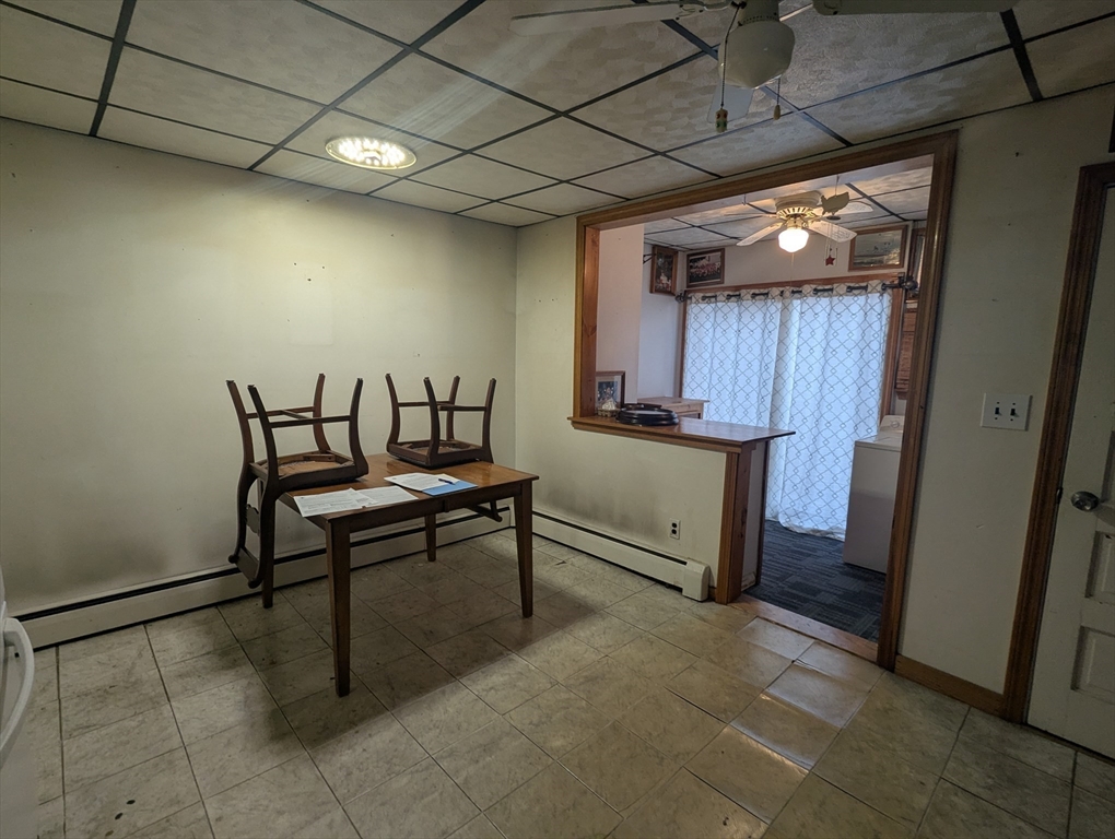 205 London Street Boston, MA 02128 - Photo 4 of 13 a view of a patio with table and chairs