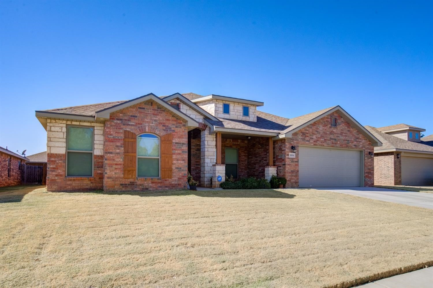 8806 Rochester Avenue Lubbock, TX 79424 - Photo 1 of 25 a view of a house with a yard