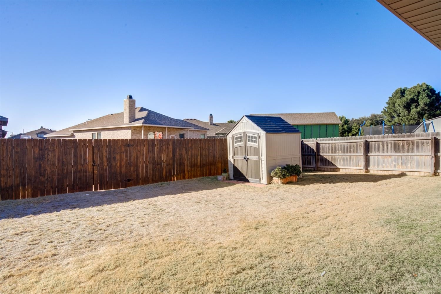 8806 Rochester Avenue Lubbock, TX 79424 - Photo 24 of 25 a backyard of a house