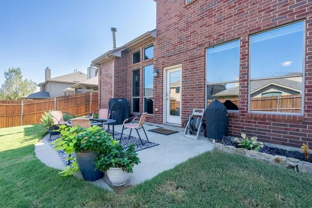 a utility room with sink dryer and washer