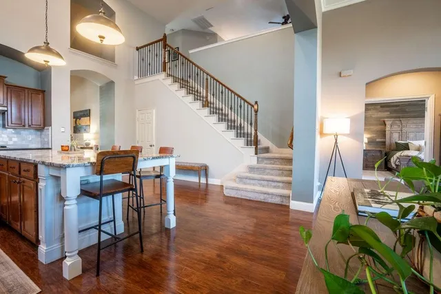 a view of entryway and dining room with furniture