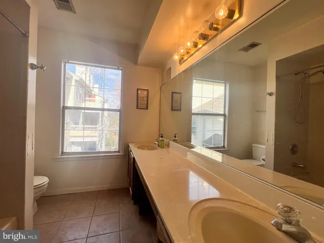 a room with a bed and a window