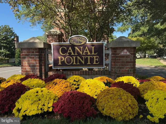 a view of a street with sign board