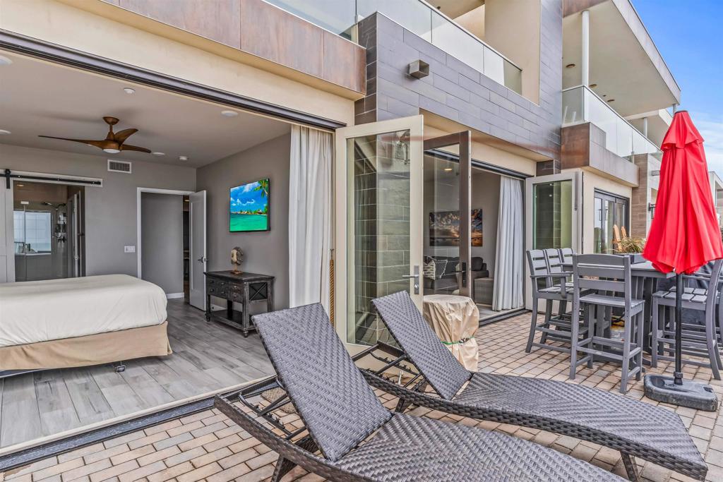 700 South The Strand, Unit 102 Oceanside, CA 92054 - Photo 16 of 25 a outdoor space with furniture