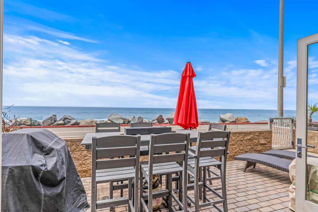 700 South The Strand, Unit 102 Oceanside, CA 92054 - Photo 2 of 25 a view of a terrace with furniture