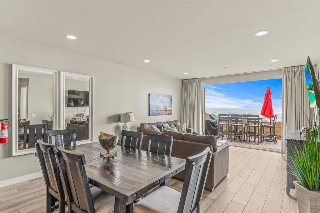 700 South The Strand, Unit 102 Oceanside, CA 92054 - Photo 8 of 25 a view of a dining room with furniture window and outside view