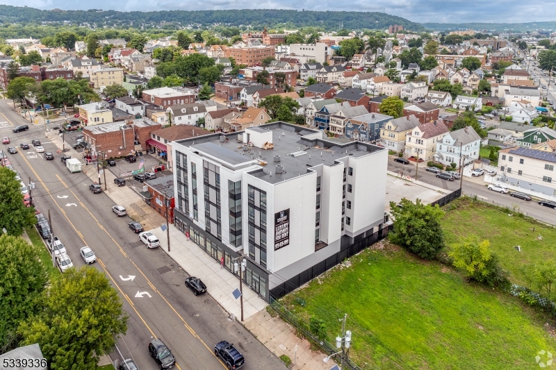 a view of a city with lawn chairs