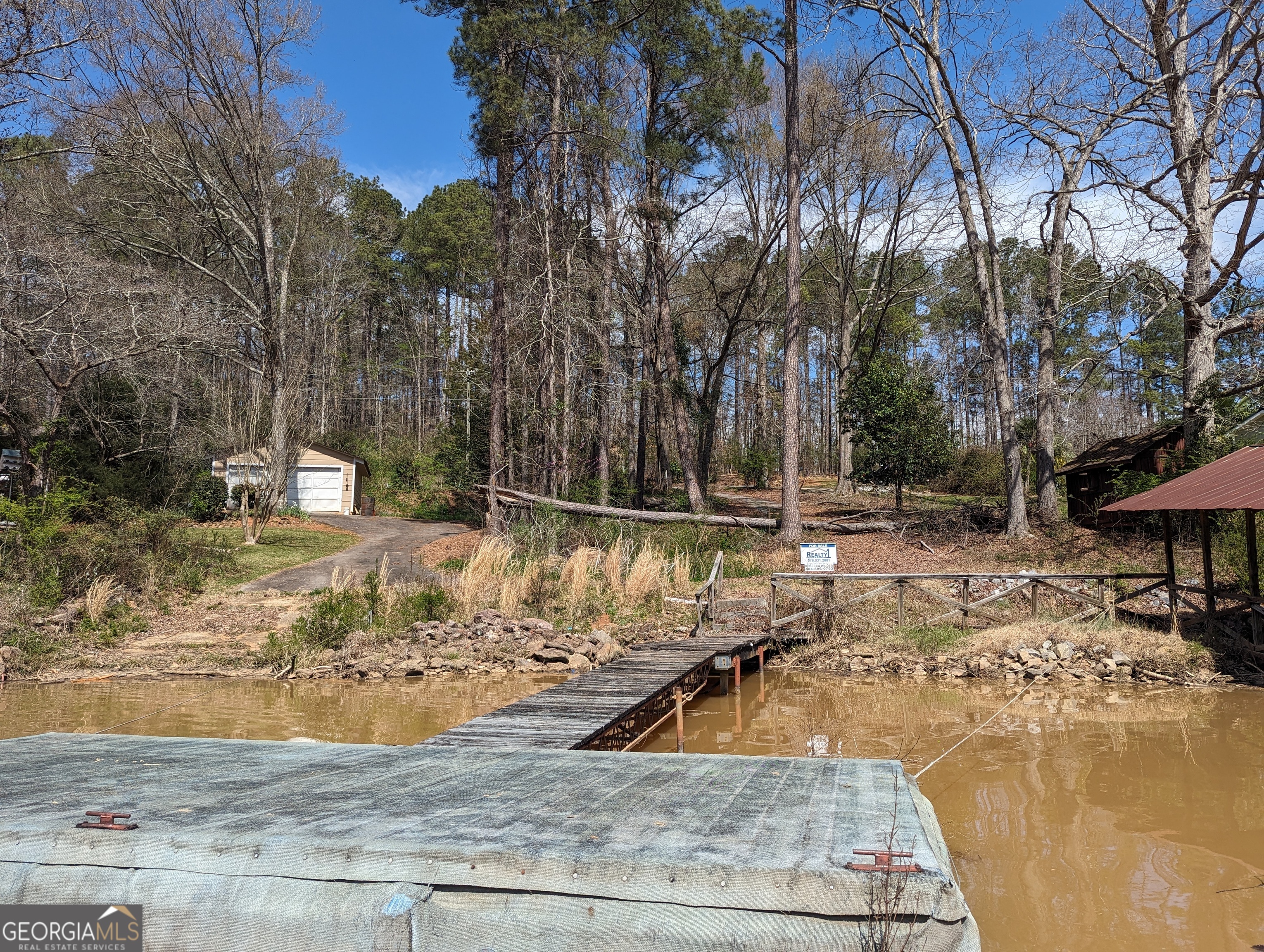0 Collins Road Jackson, GA 30233 - Photo 6 of 7 a view of a yard with swimming pool
