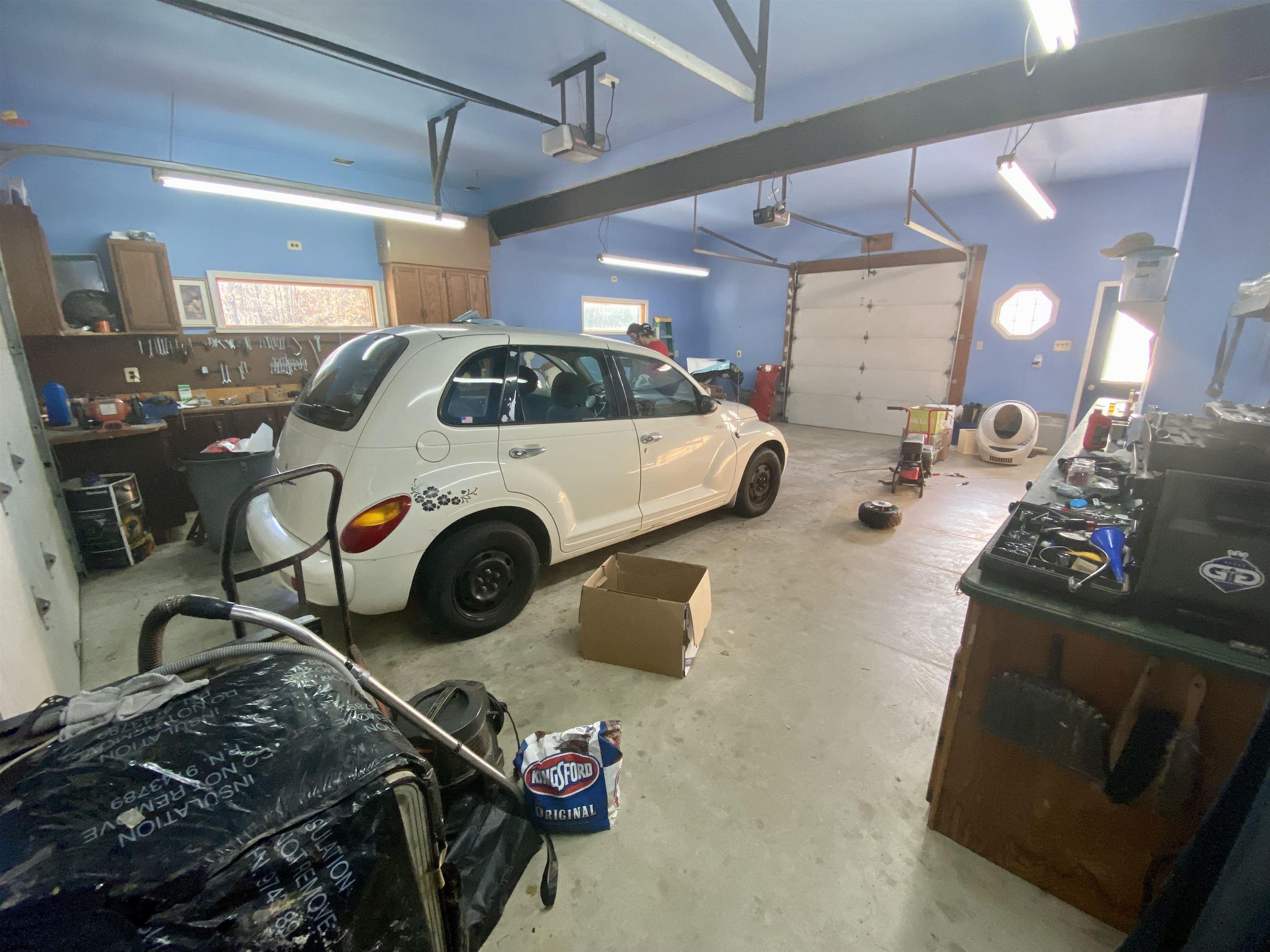 6705 Weymouth Road Mays Landing, NJ 08330 - Photo 14 of 38 a car parked in a garage