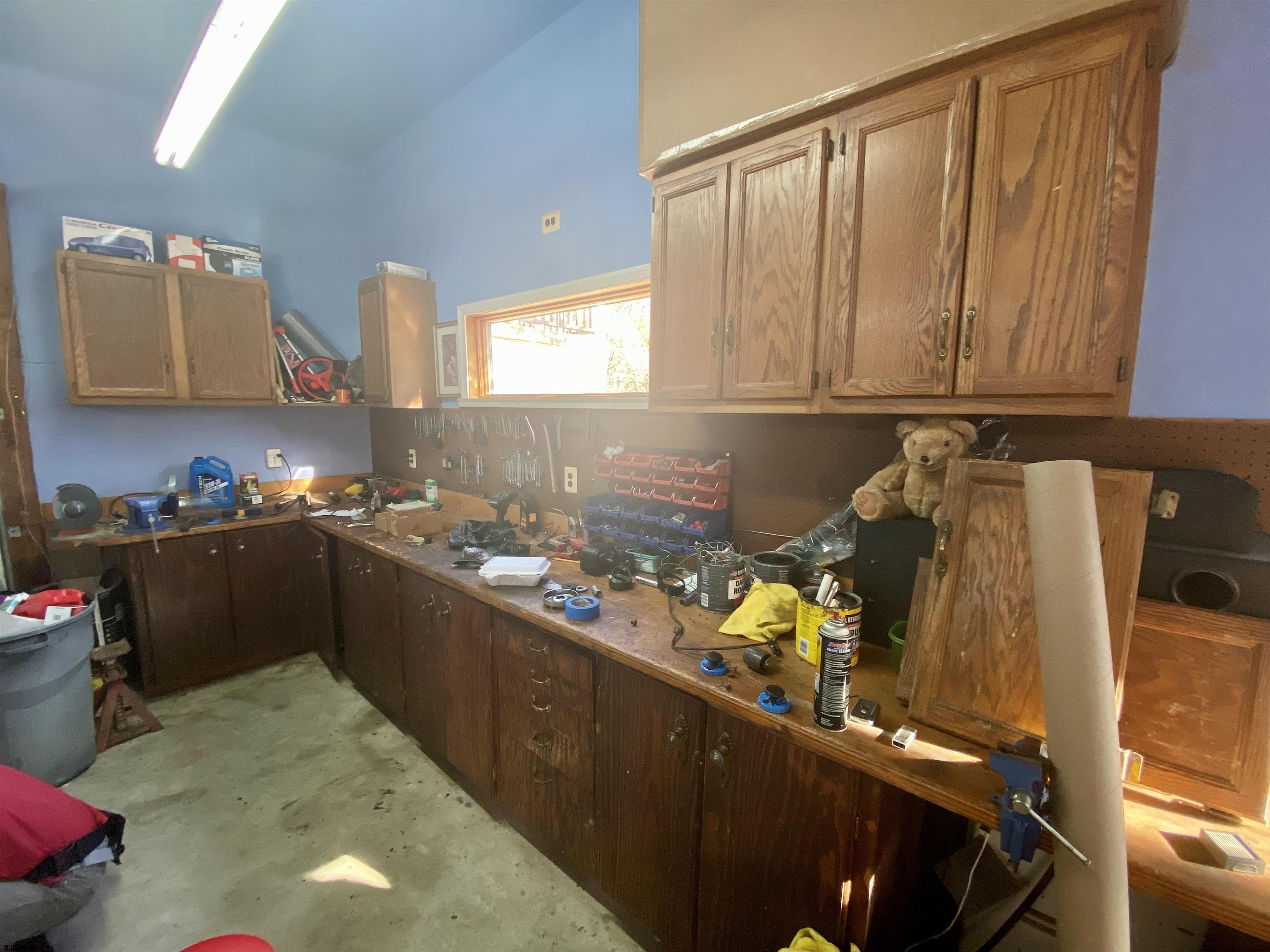 6705 Weymouth Road Mays Landing, NJ 08330 - Photo 16 of 38 a kitchen with granite countertop a refrigerator and a stove top oven