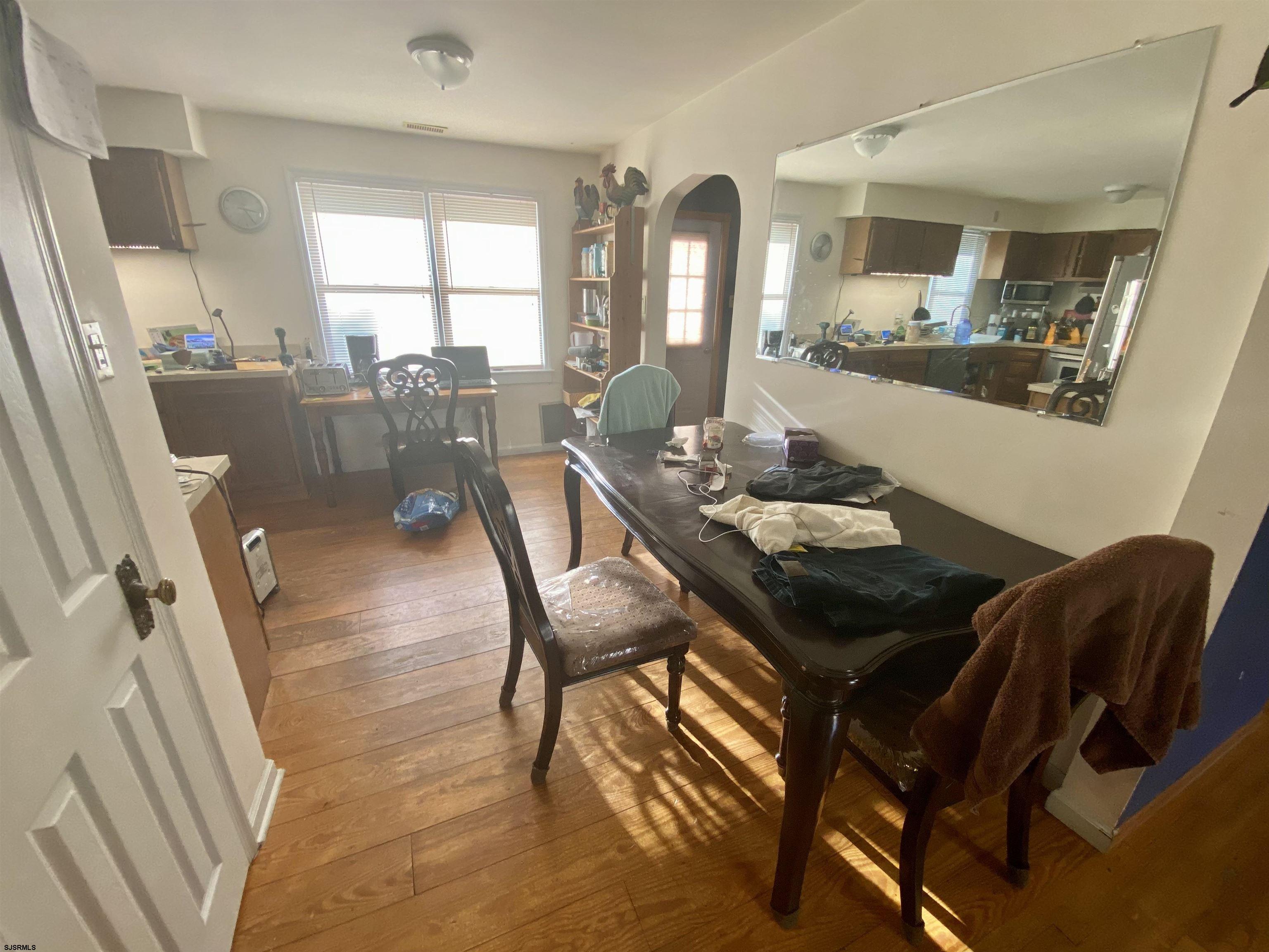 6705 Weymouth Road Mays Landing, NJ 08330 - Photo 19 of 38 a view of a dining room with furniture and wooden floor