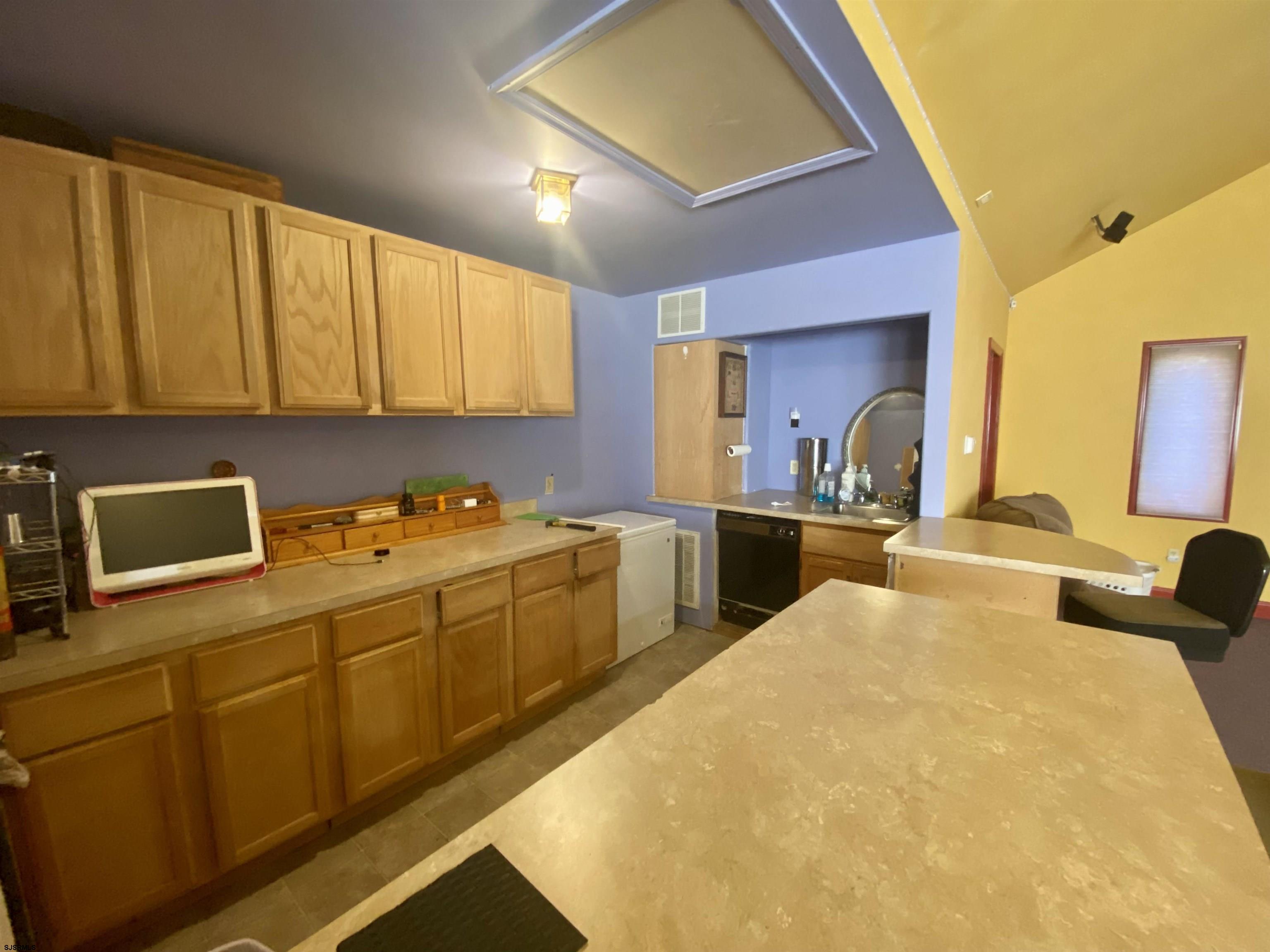 6705 Weymouth Road Mays Landing, NJ 08330 - Photo 30 of 38 a kitchen with sink and cabinets