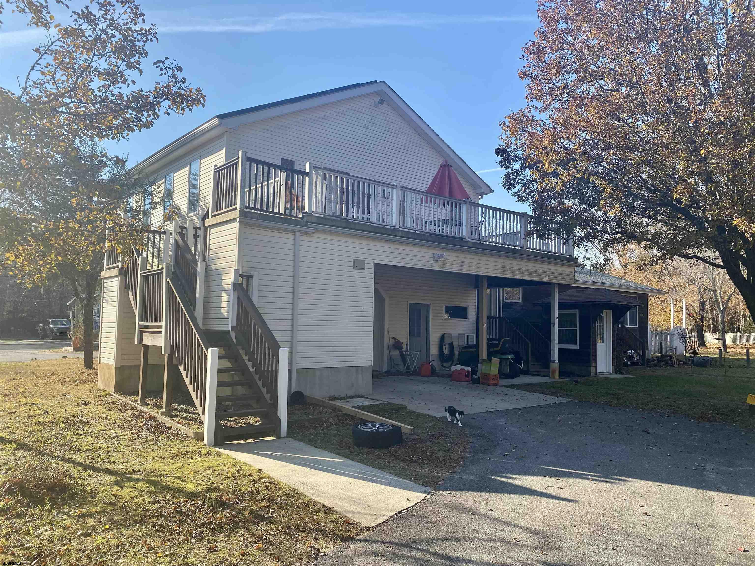 6705 Weymouth Road Mays Landing, NJ 08330 - Photo 4 of 38 a front view of a house with a yard