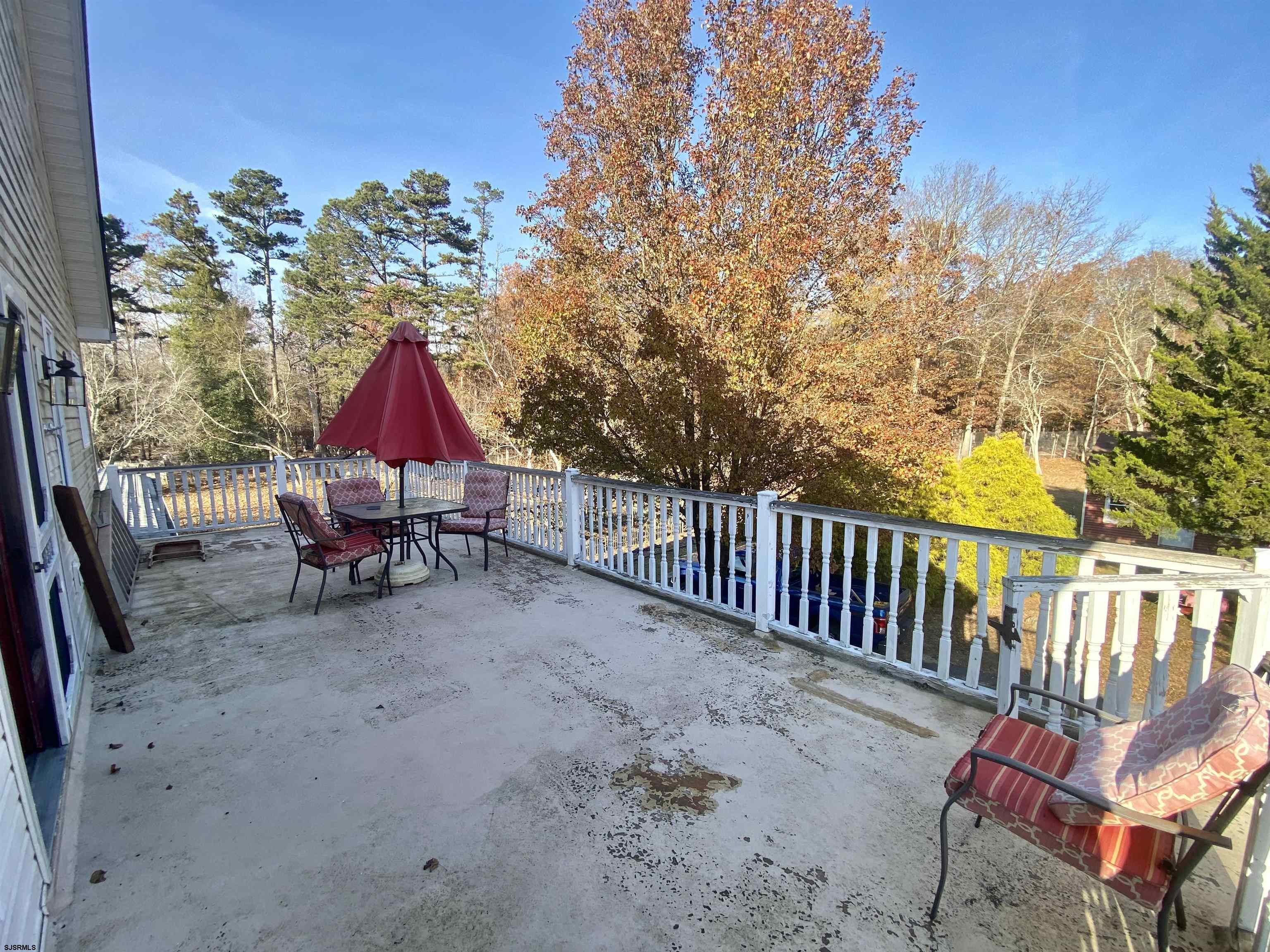 6705 Weymouth Road Mays Landing, NJ 08330 - Photo 31 of 38 a view of a sitting area with furniture and wooden fence