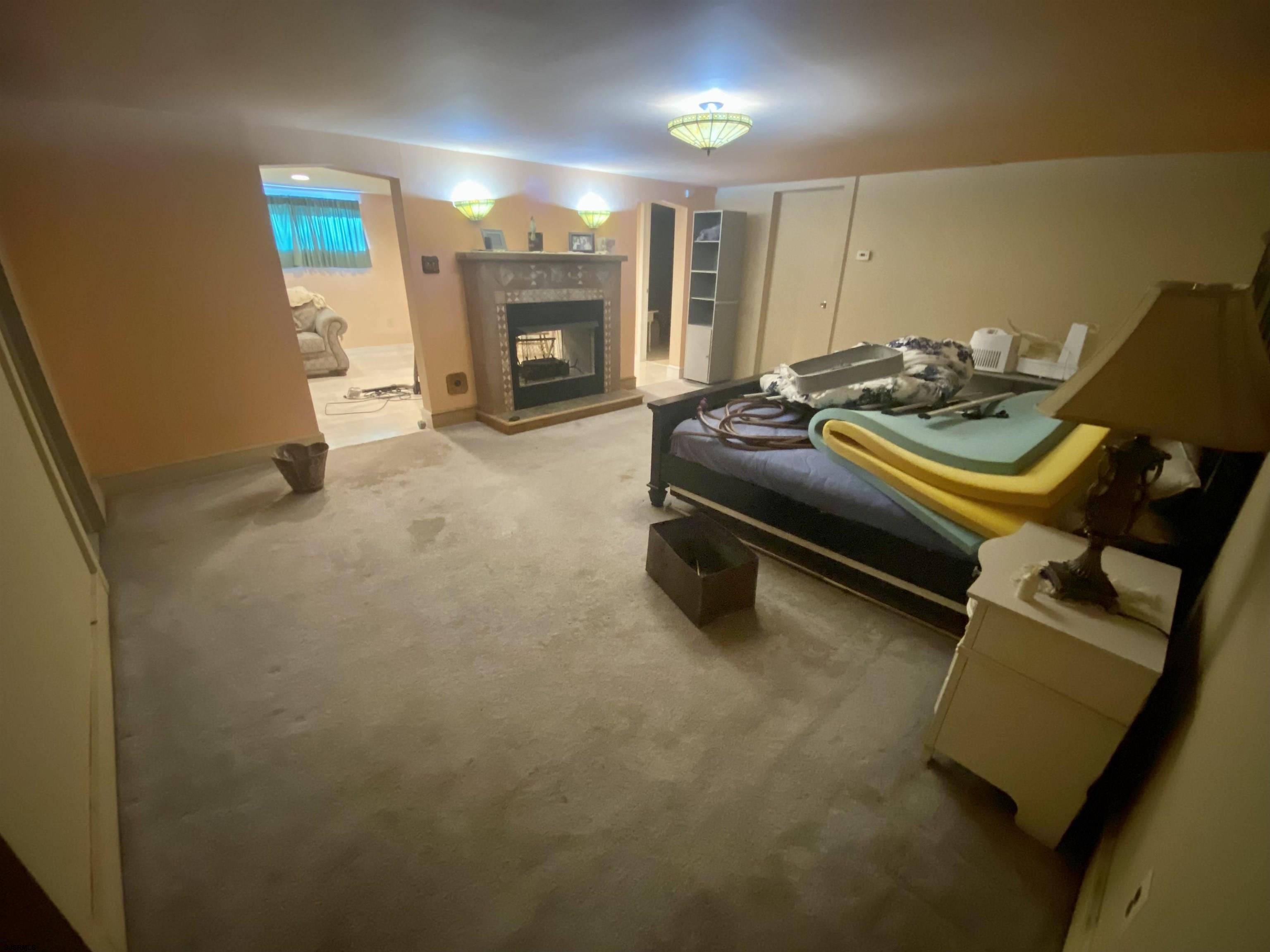 6705 Weymouth Road Mays Landing, NJ 08330 - Photo 37 of 38 a living room with furniture and a fireplace