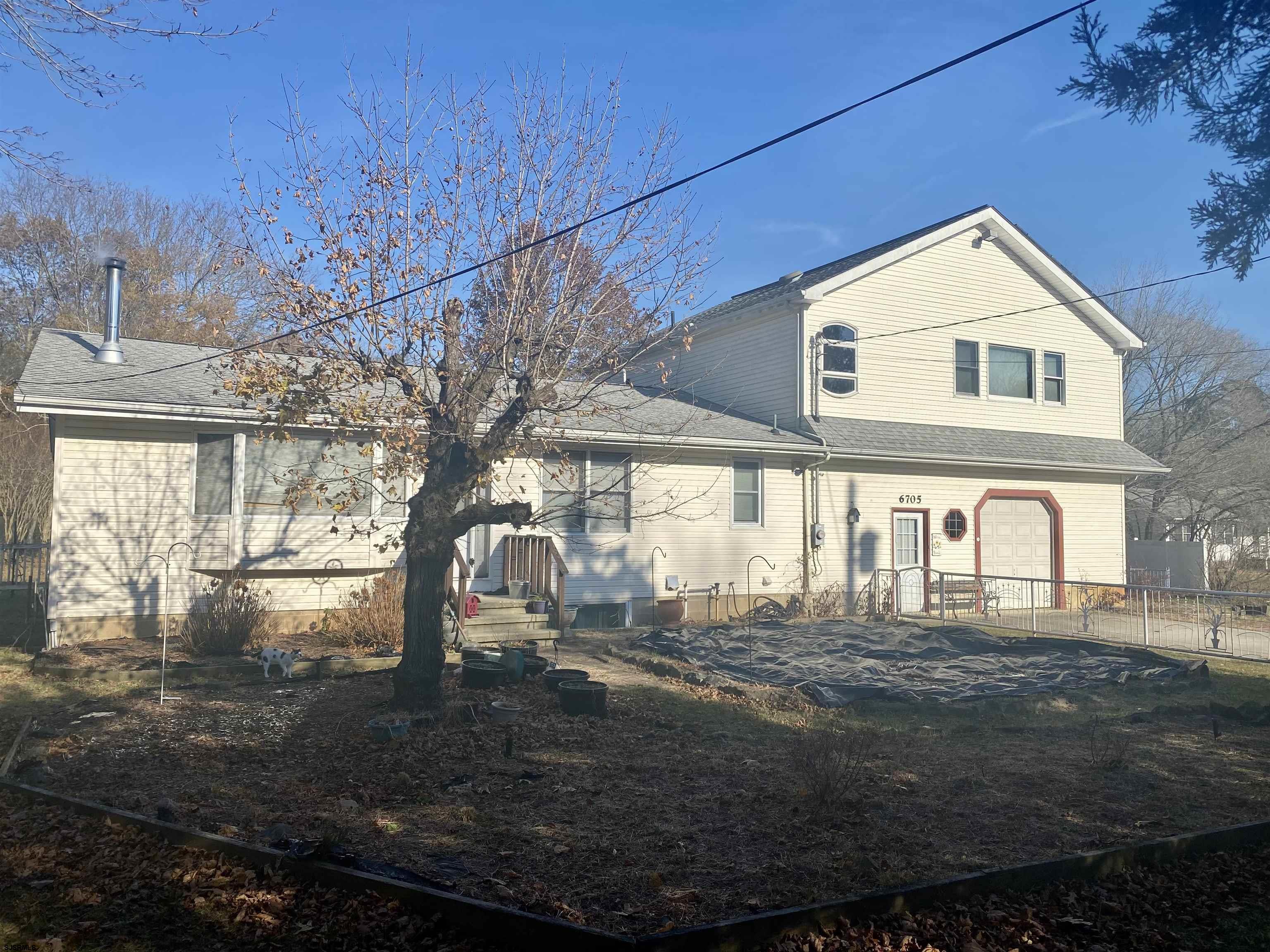 6705 Weymouth Road Mays Landing, NJ 08330 - Photo 7 of 38 a front view of a house with a yard