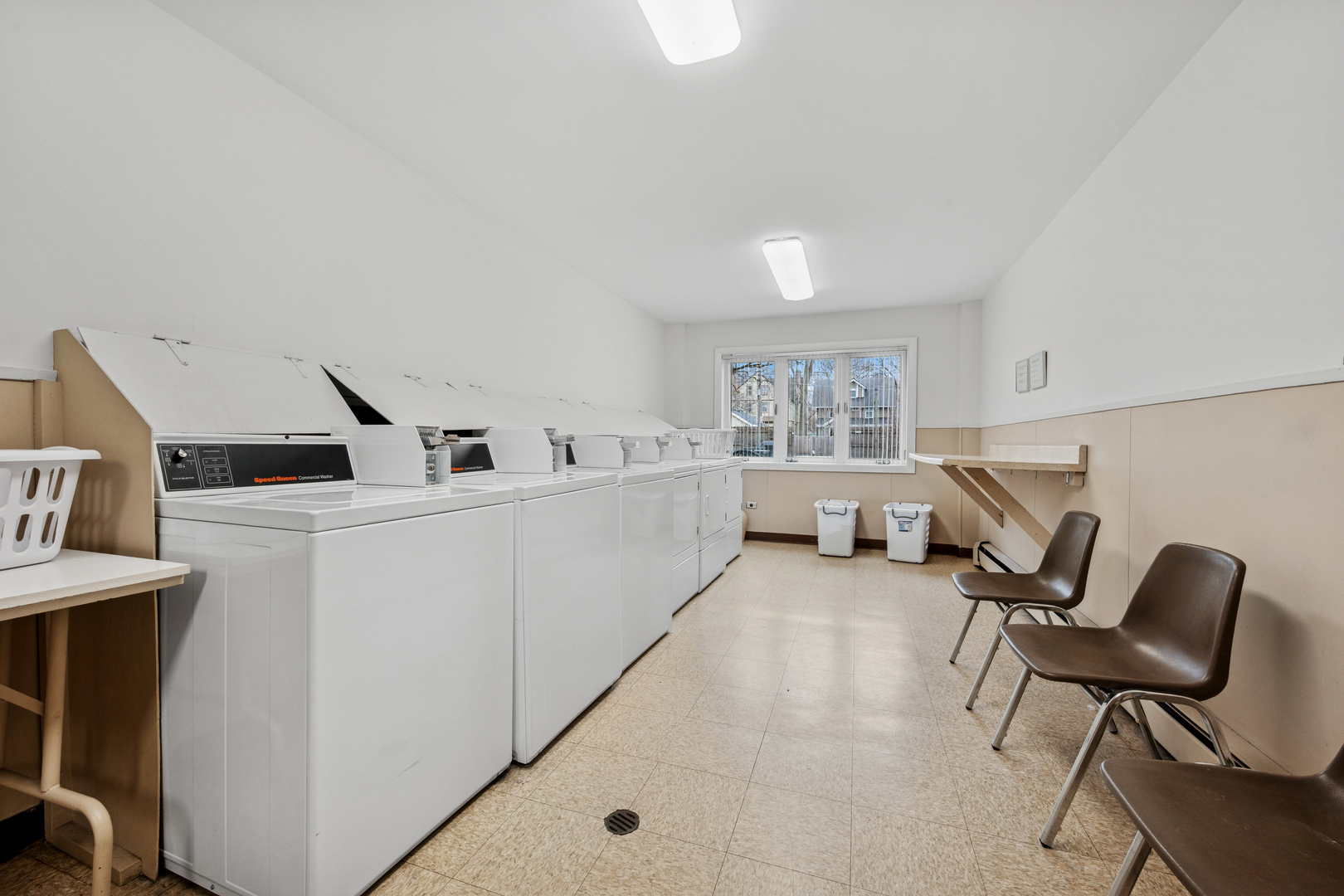 2033 Sherman Avenue, Unit 504 Evanston, IL 60201 - Photo 20 of 23 a living room with furniture and a window