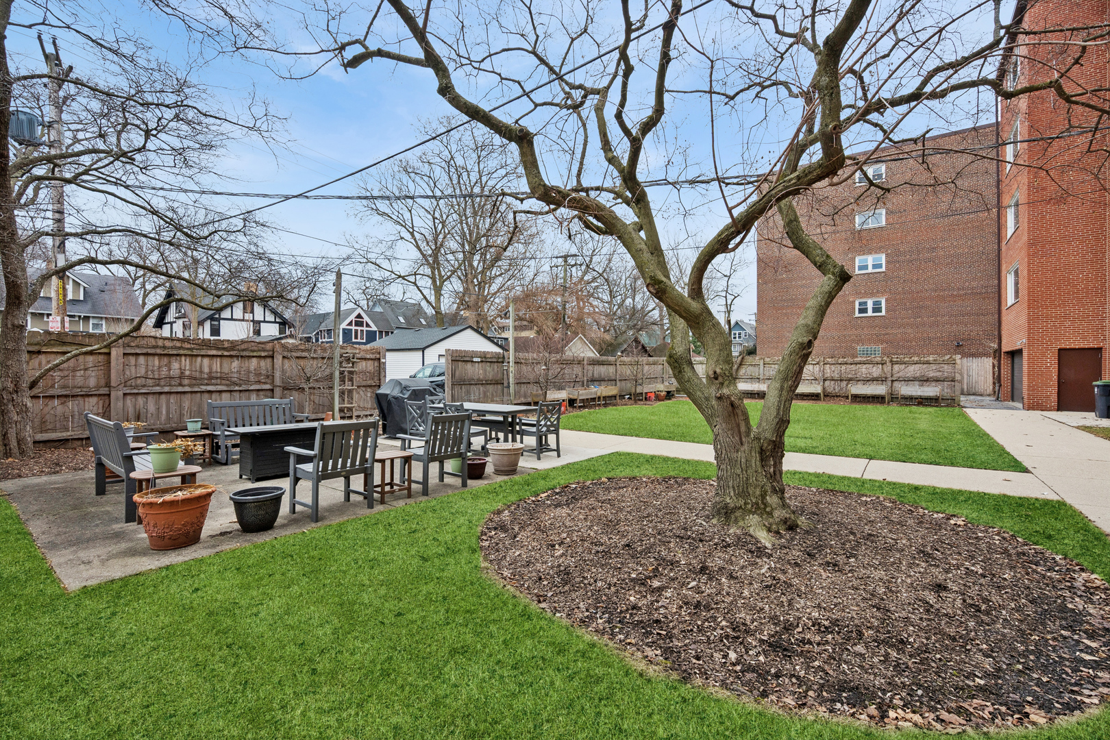 2033 Sherman Avenue, Unit 504 Evanston, IL 60201 - Photo 22 of 23 a view of a house with backyard and a tree