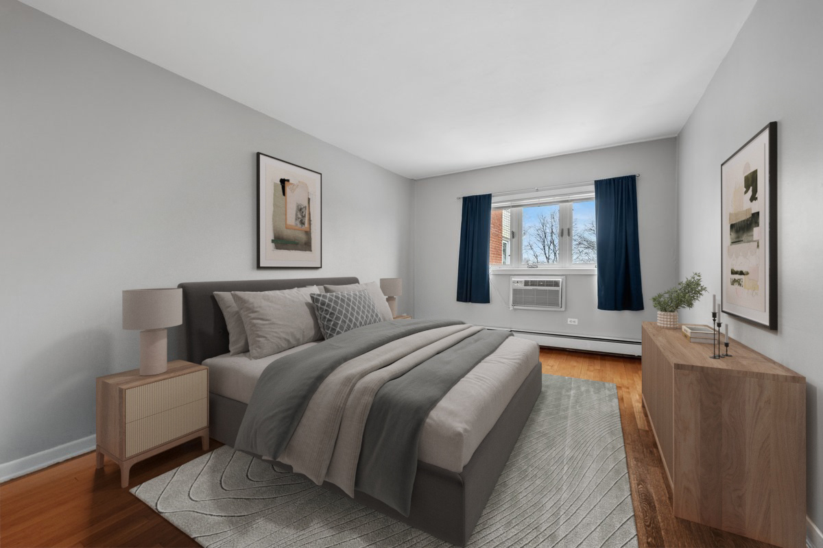 2033 Sherman Avenue, Unit 504 Evanston, IL 60201 - Photo 7 of 23 a spacious bedroom with a large bed and a flat screen tv