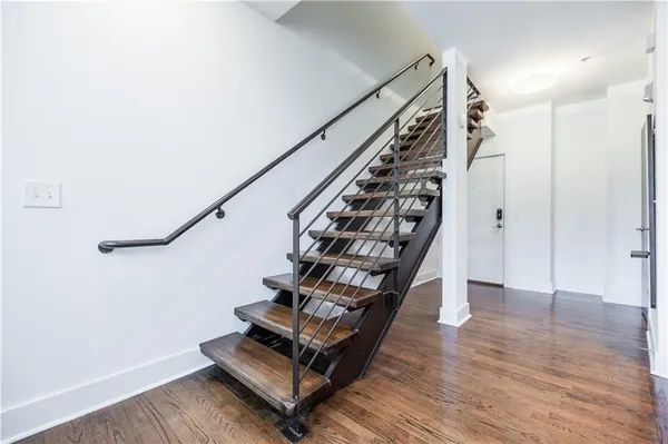 a view of entryway with wooden floor