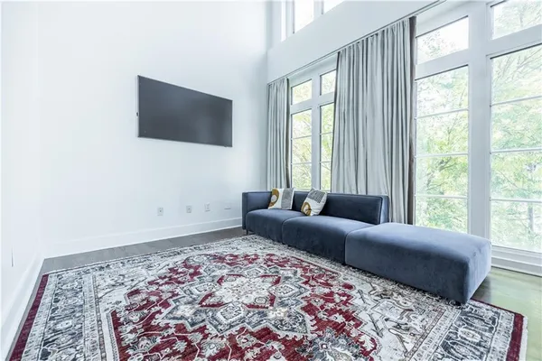 a living room with a couch and a flat screen tv